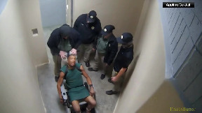 3 jailers watch as officer wrapped chain around detainee’s neck and briefly choked him