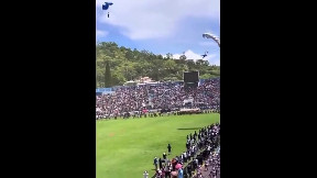 Multiple Honduran special forces try parachuting into a sports arena