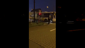 Train rams bus at level crossing