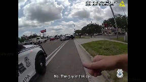 Tampa police rescue 7-year-old boy, father trapped in SUV