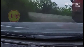 Overtaking a truck on curvy mountain road