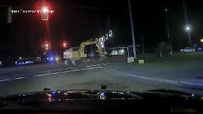 North Charleston police video shows slow-speed chase with excavator that damaged business