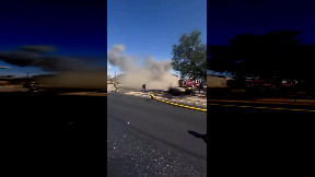 Firefighters escape dramatic roof collapse during blaze