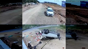 Lady ejected during crash and walks away