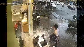 Scooter rider crashes into store glass doors