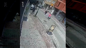 Lighting column fell on a woman
