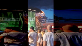 Ferris wheel catches fire