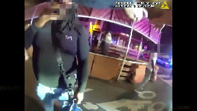Metro police officer pushed and knocked out a bystander who enter a crime scene