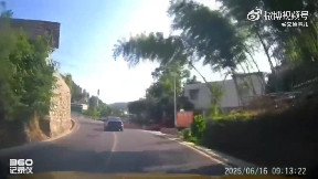 Digger falls off truck