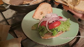 Anna makes an american hamburger for you