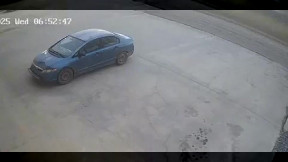Runaway tire bounces over car