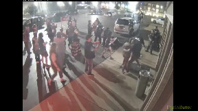 Ferguson Officer Travis Brown gets knocked down on sidewalk, suffers with life-threatening brain injury