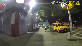 NYPD officers save woman from burning apartment in Queens