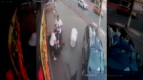 Pedestrians almost got hit by a car.