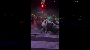 Driver smashes into people during street takeover