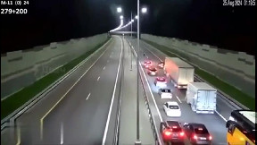 Bear Runs On Highway