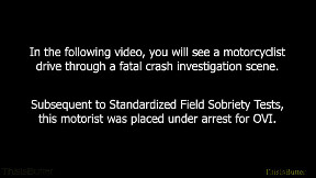 Video shows motorcyclist being arrested for an OVI when he drove through a fatal crash scene