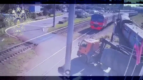 Train collides with dump truck