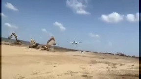 Plane almost lands on unfinished runway