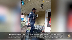 IMPD bodycam shows officers arresting a barricaded suspect who set the house on fire