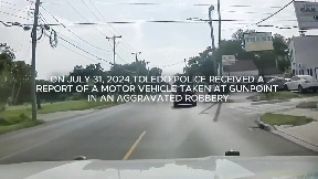 Dashcam shows an armed man in a stolen vehicle leading Toledo police on a high speed chase