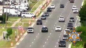 Macomb County Sheriff’s deputy jumps into a moving truck to help elderly driver with a medical issue