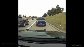 Bodycam video shows suspect running across Detroit-area freeway to flee police during traffic stop