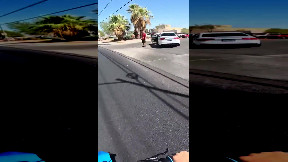 Guy gets shot at after hitting the side view mirror on a car