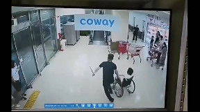 Saving woman in a wheelchair