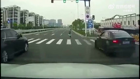 Granny crosses the road safely